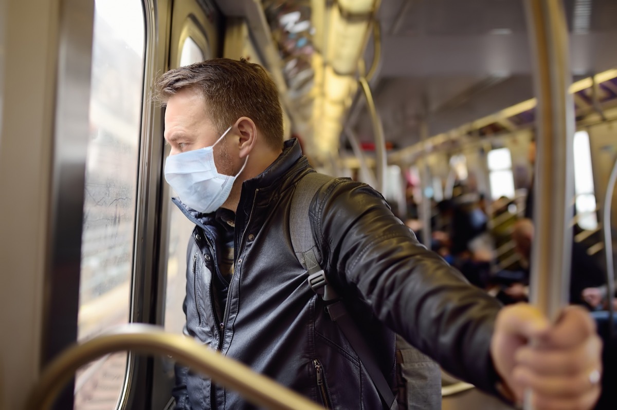 Man wearing a mask the subway