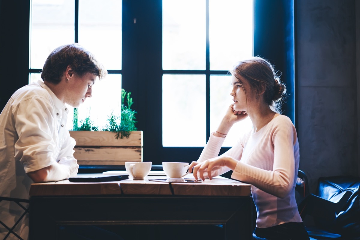 upset man at coffee with woman