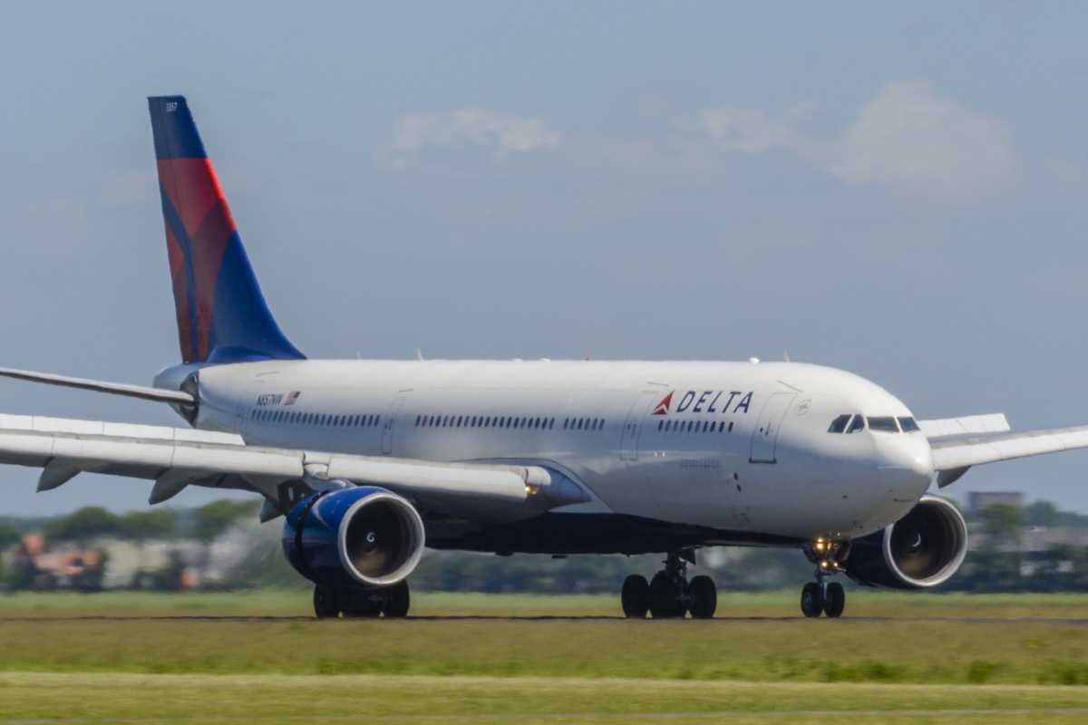 Delta Airlines Airbus A330 landing at Schiphol airport near Amsterdam in The Netherlands.