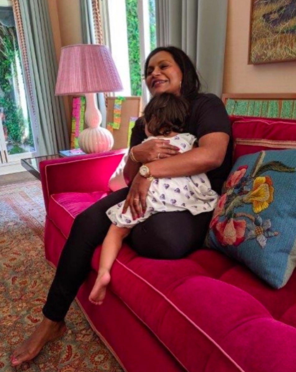 Mindy Kaling holding daughter Katherine