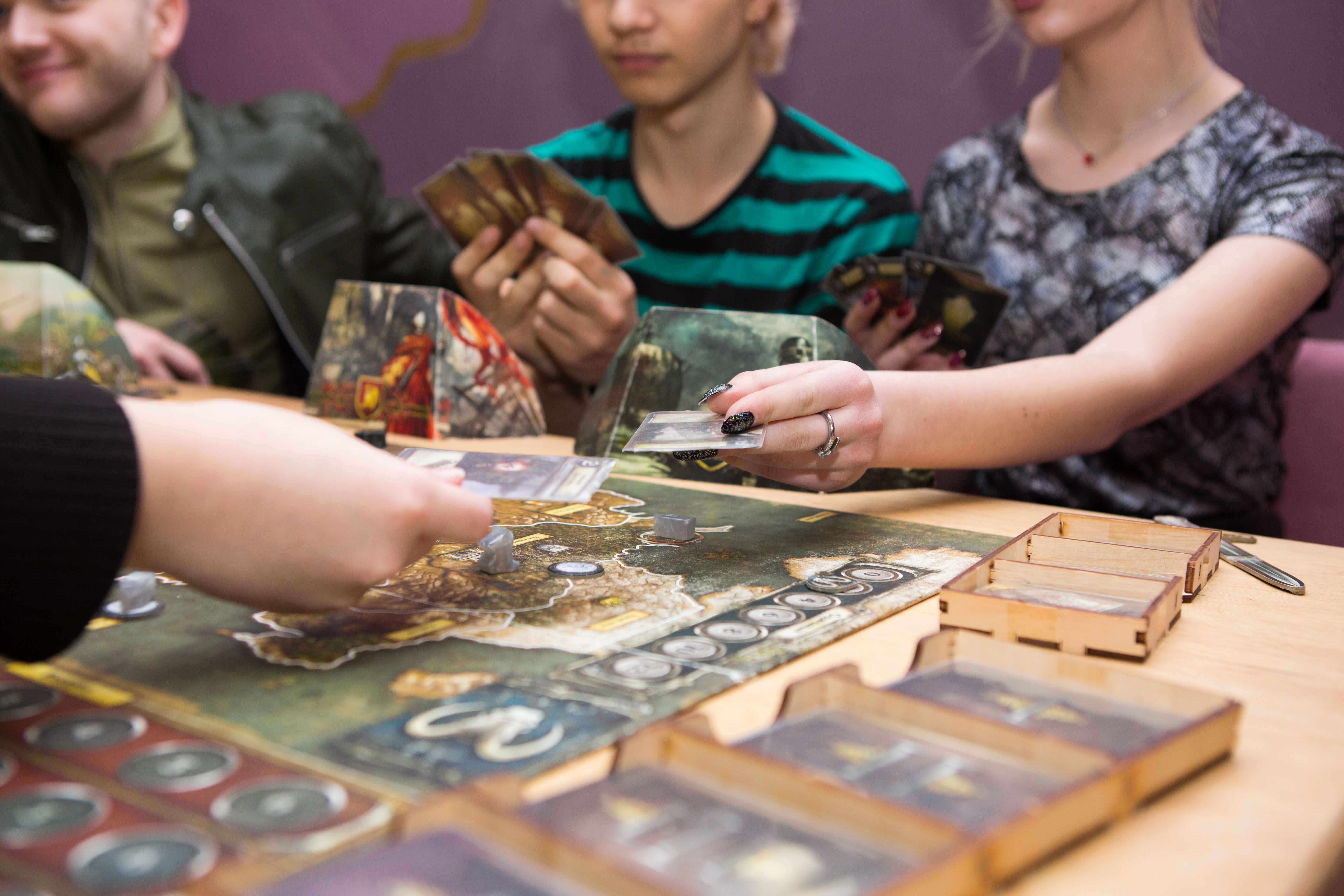 group of friends playing a board game