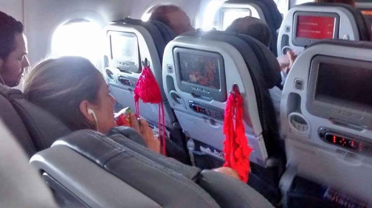 Woman drying out bikini on airplane photos of terrible airplane passengers