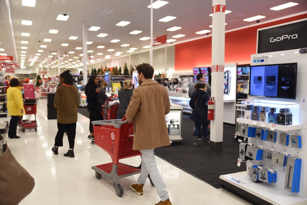 Shoppers rush through a busy Target on Black Friday.