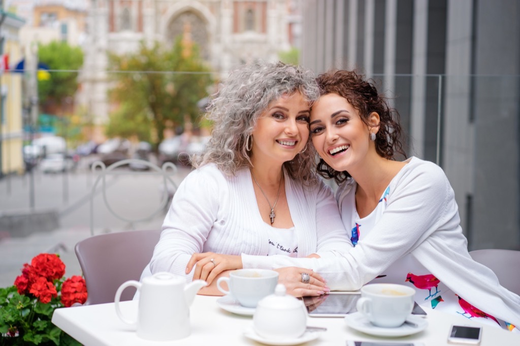 older mom parent and daughter out to eat