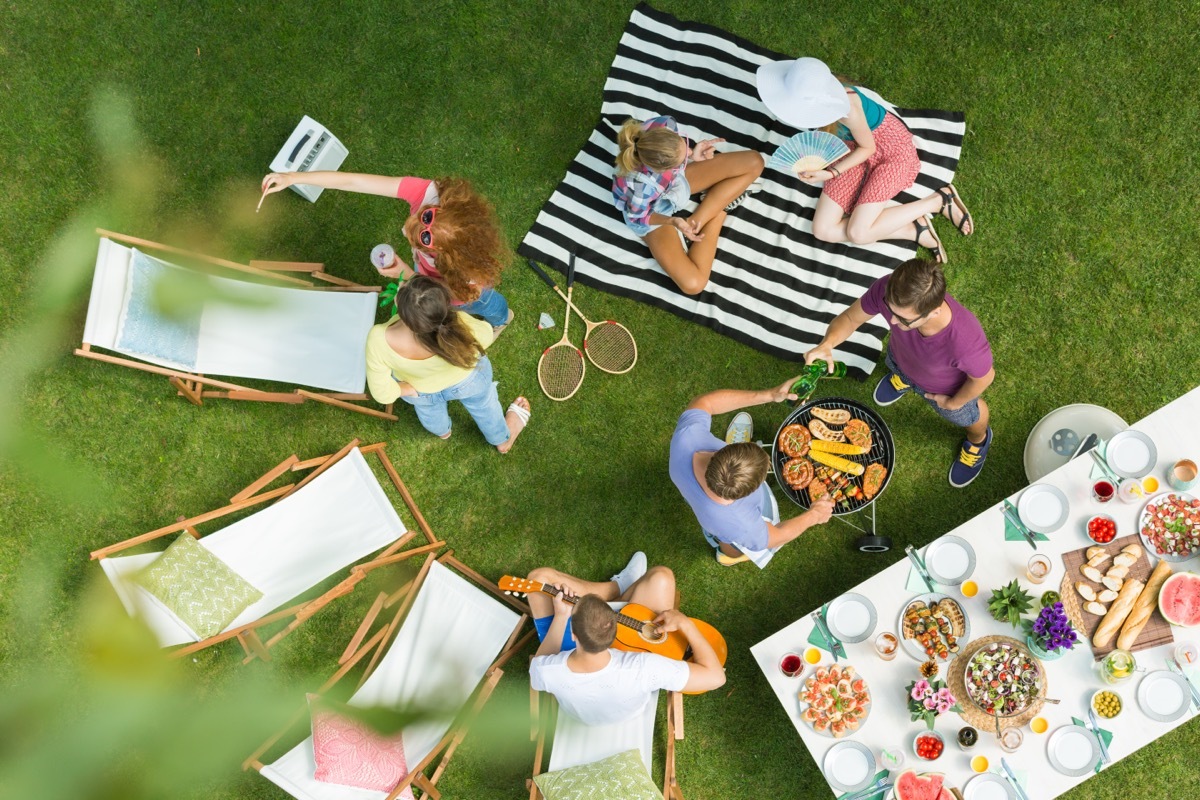 people sitting in backyard