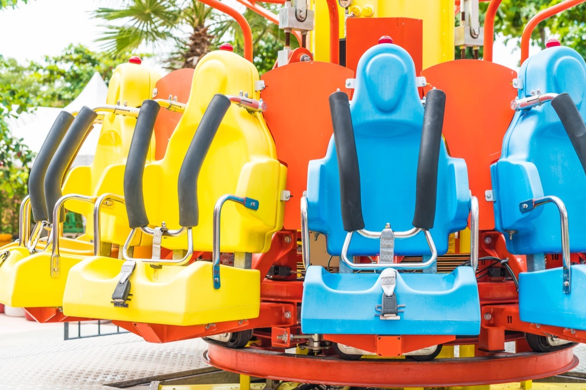 Empty seats on an amusement park ride