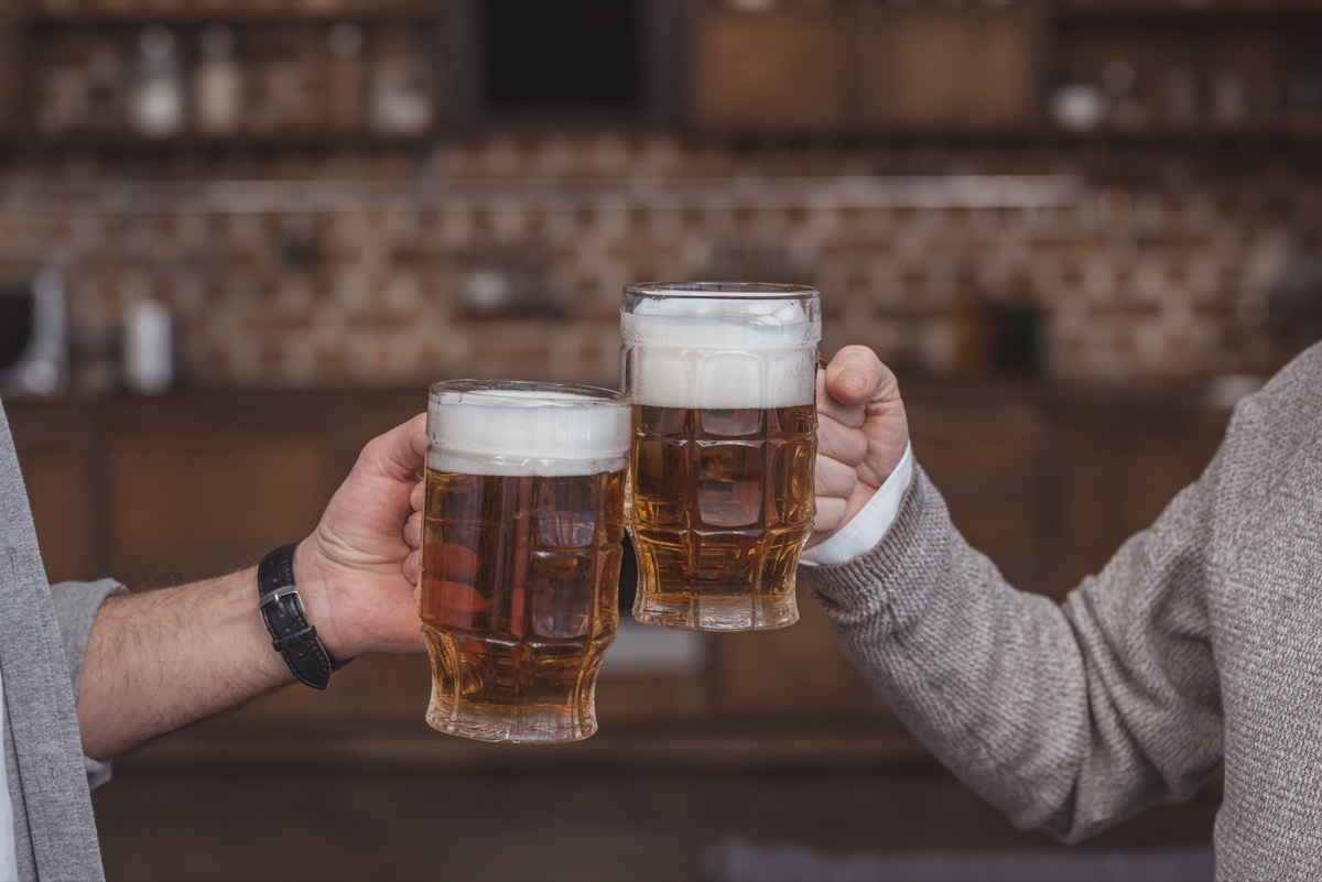 Father and son drinking beer