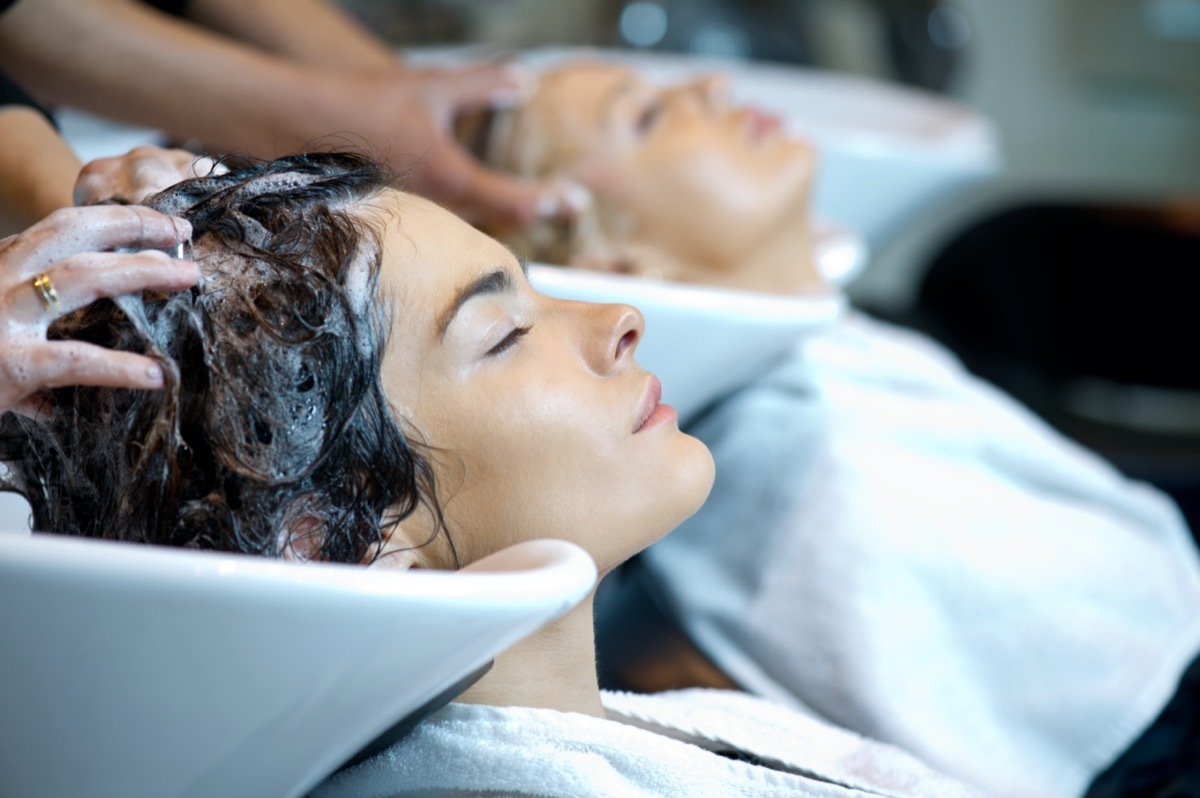 woman getting a hair wash. In a hair salon