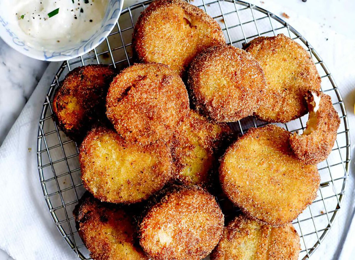 plate of fried green tomatoes with dipping sauce