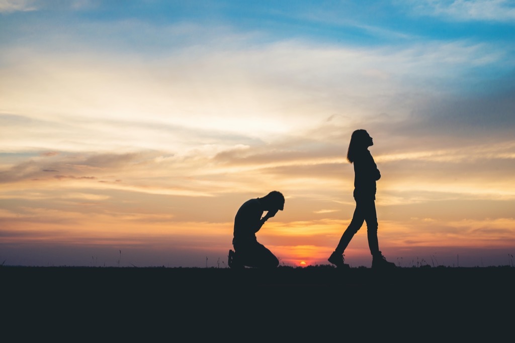 Couple on a beach after a breakup fear of commitment