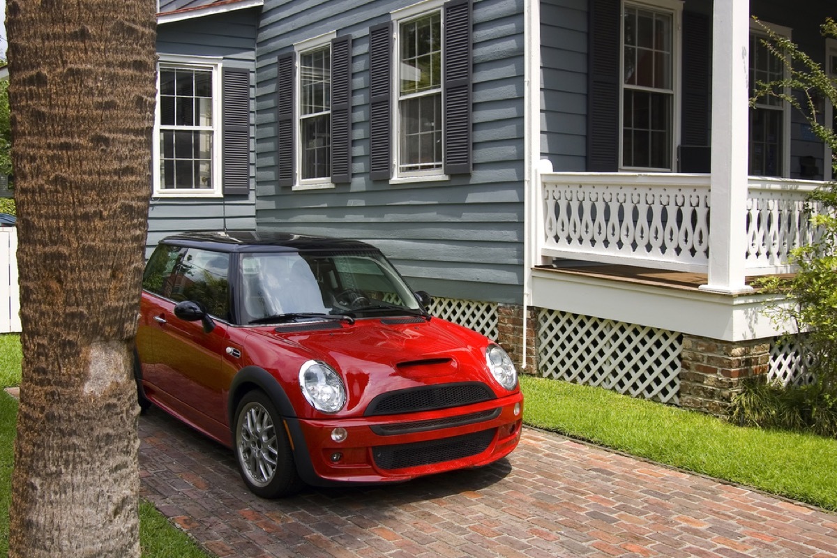 fiat mini parked outside victorian home, get rid of kids stuff