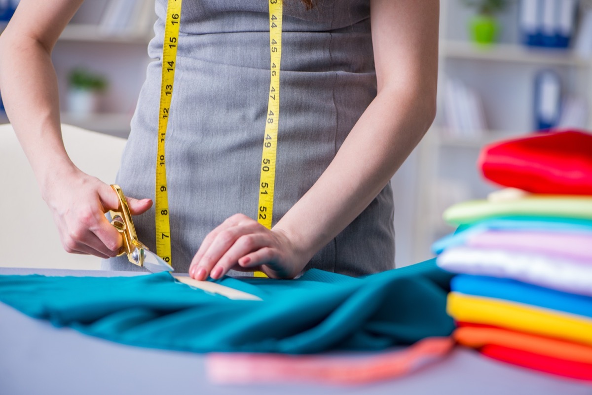 woman upcycling a sweater