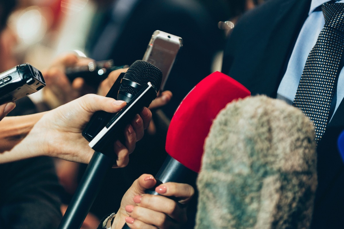 microphones gathered for news press conference