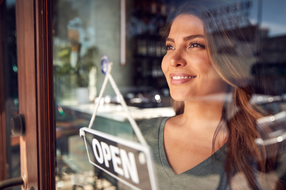 Woman looking proud as she flips the 