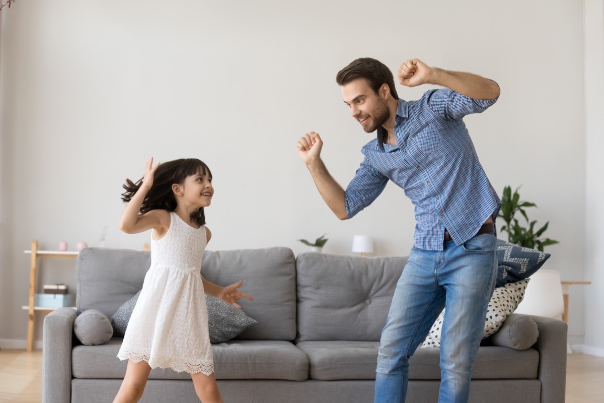 dad dancing with his daughter