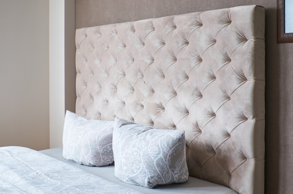 tall tan tufted headboard