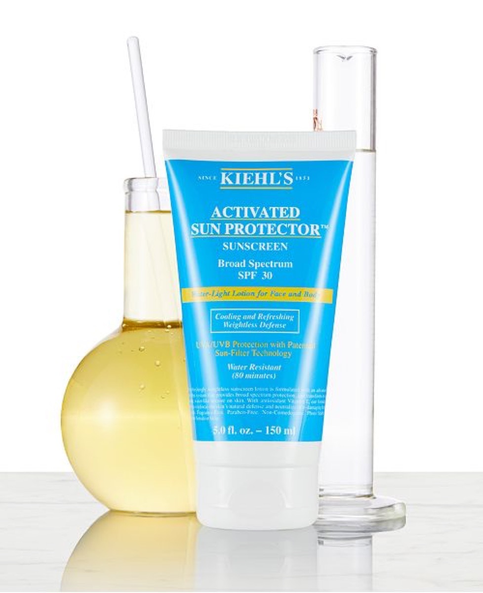 Kiehl's sunscreen in front of ingredients