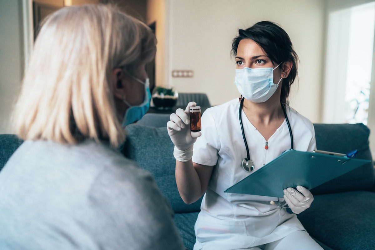 Female doctor consults mature patient during the quarantine for coronavirus