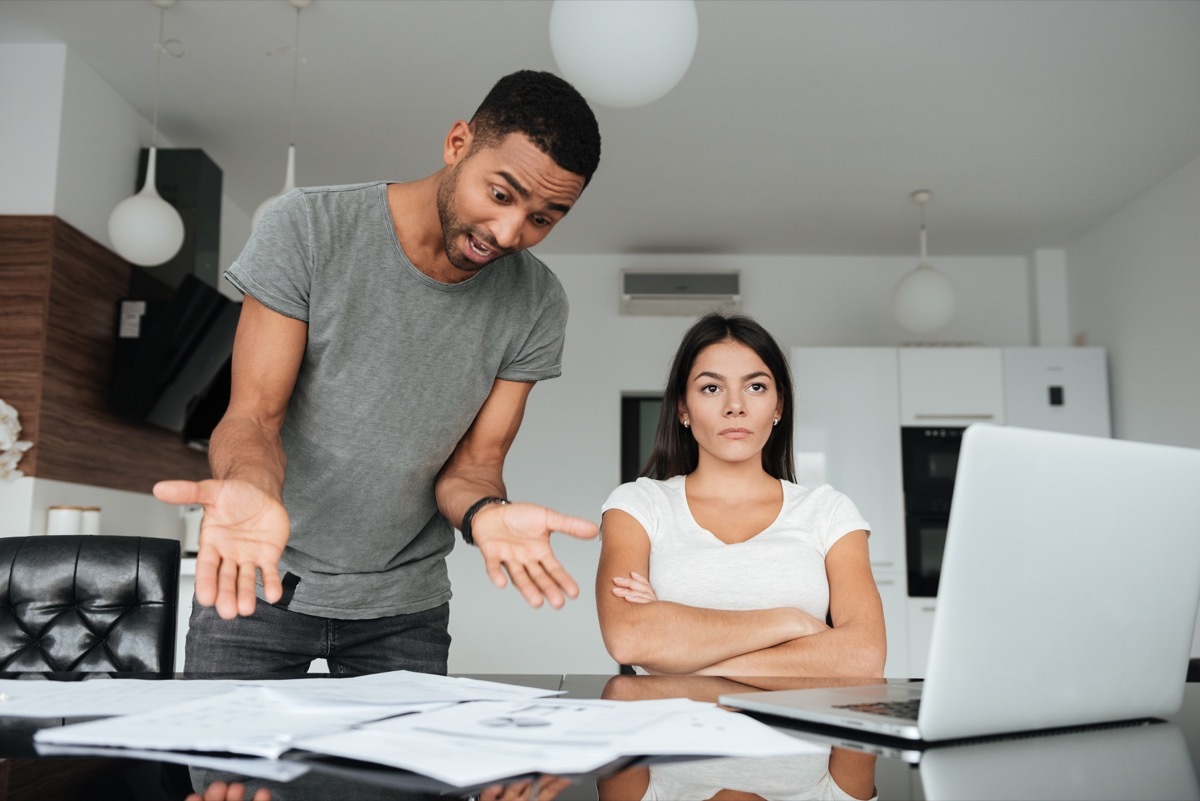 Man being critical of his partner at home