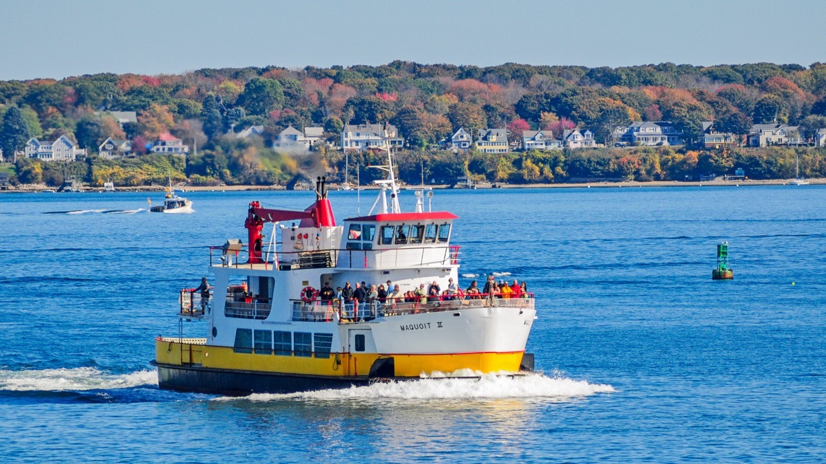 a ferry shuttles passengers in casco bay in portland maine