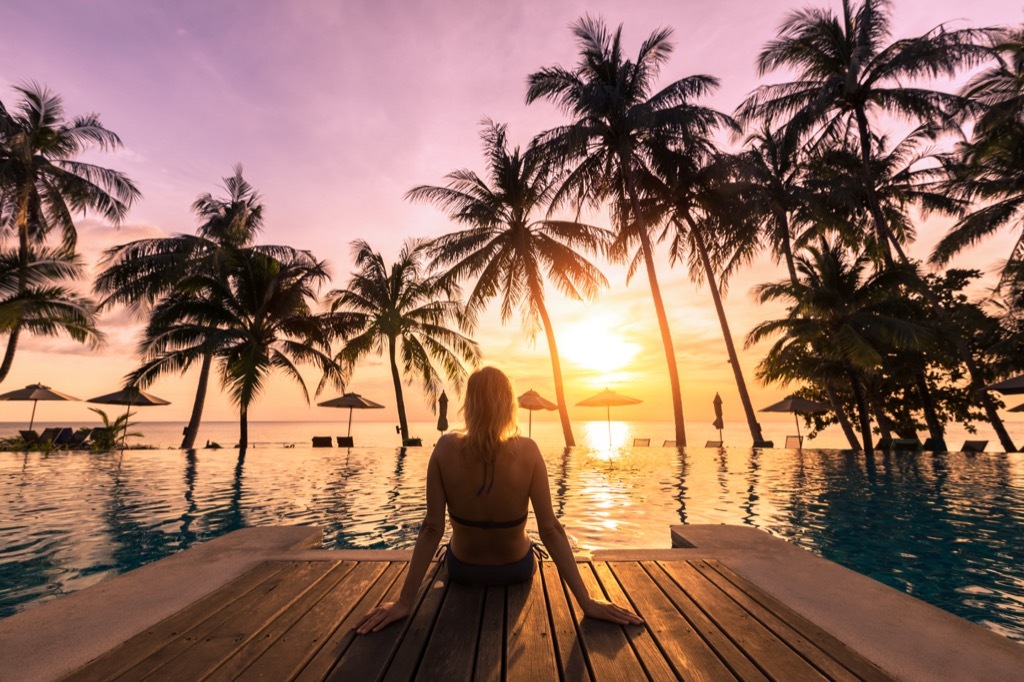 woman vacationing by pool