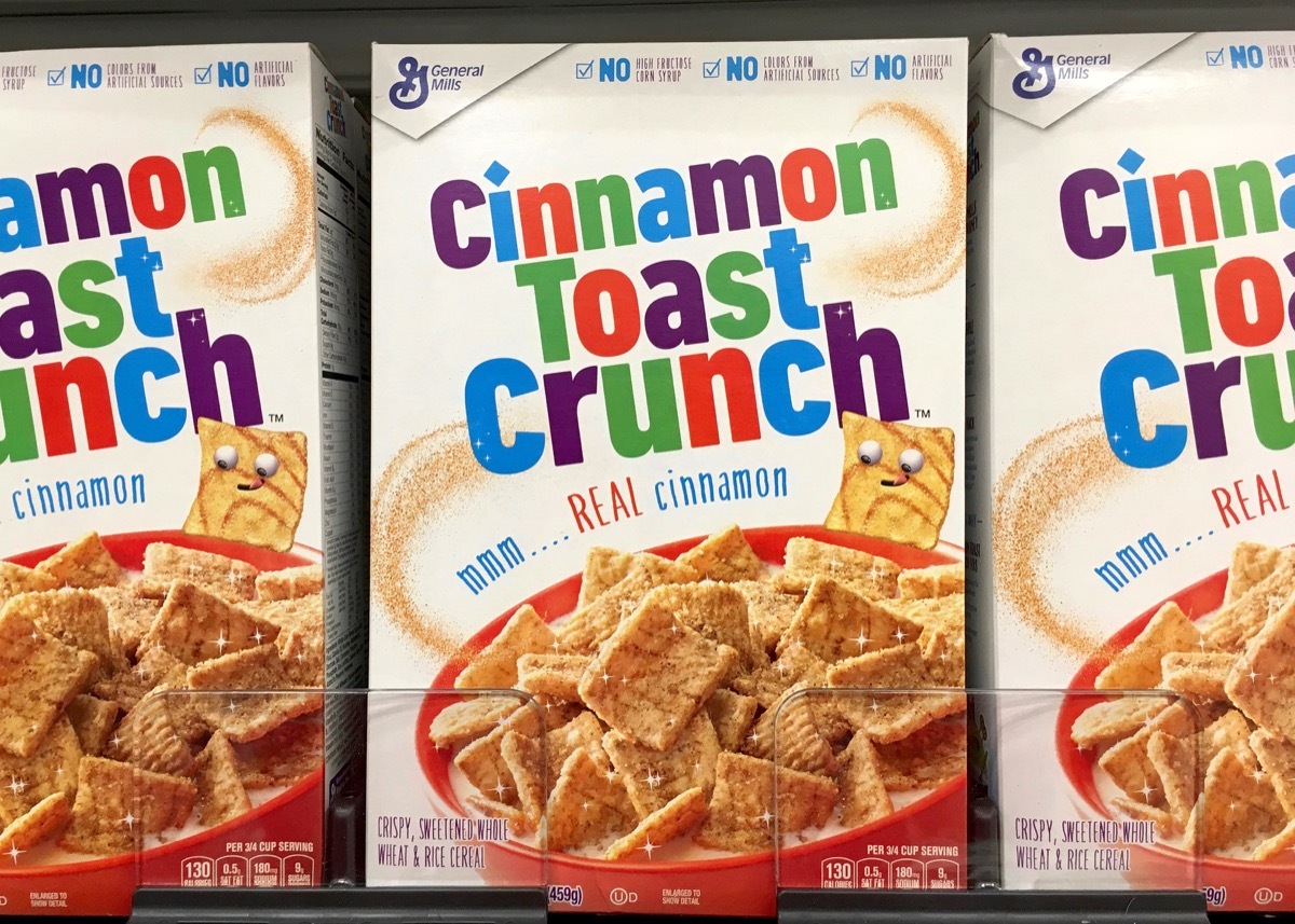 Alameda, CA - July 21, 2017: Grocery store shelf with boxes of General Mills brand Cinnamon Toast Crunch cereal.