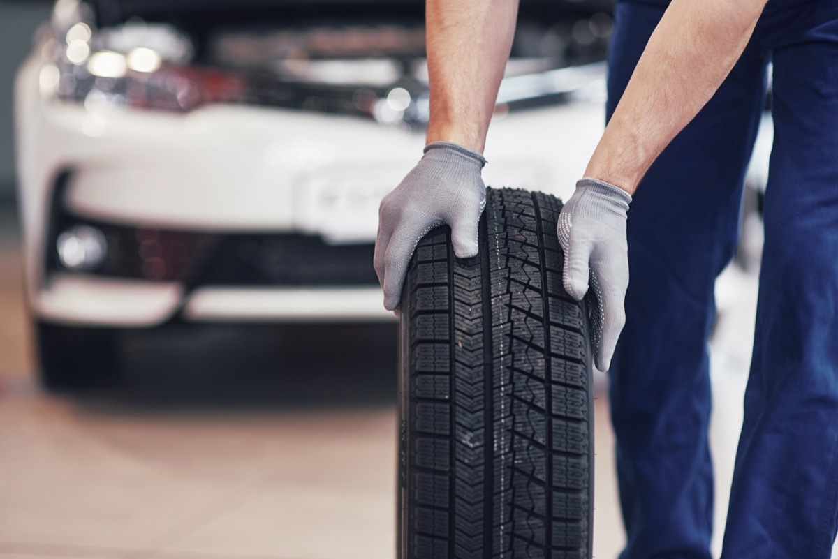 Man Holding a Car Tire {Never Buy on Craigslist}