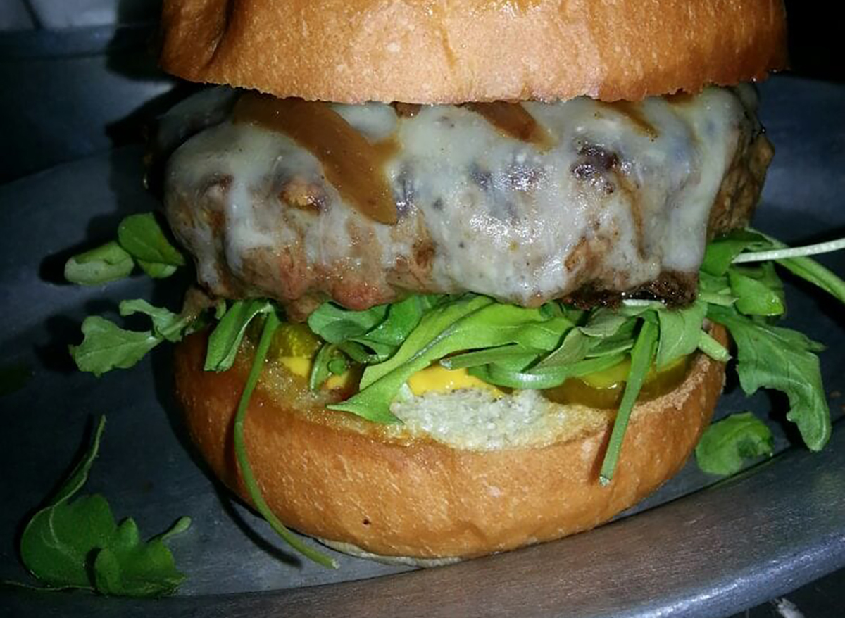 burger with cheese and arugula