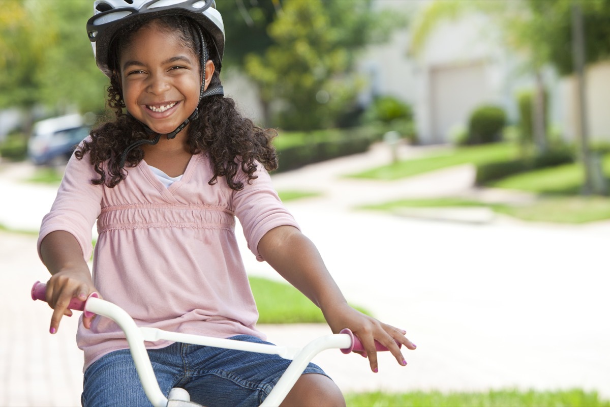 young girl riding bike