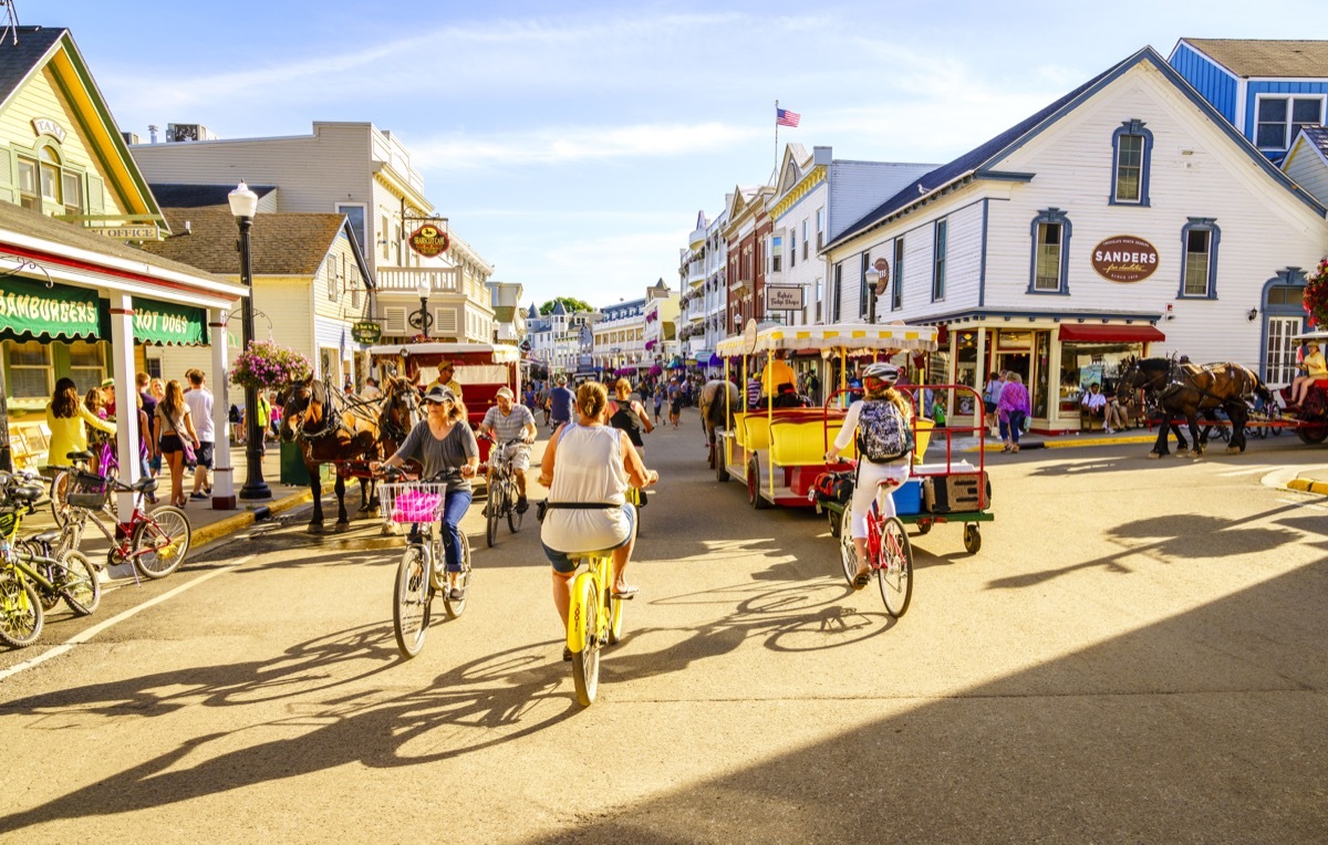 people enjoying the summer on Mackiniac island main street