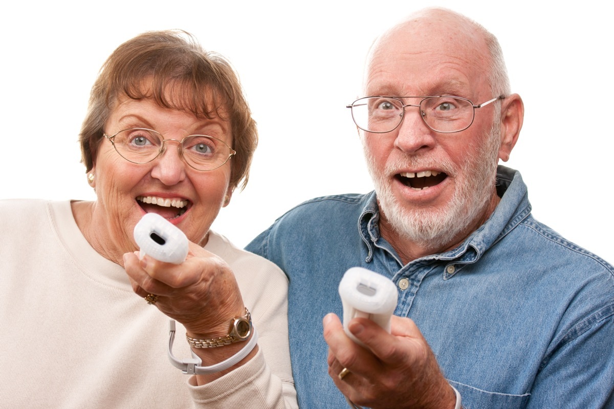 grandparents playing wii fit