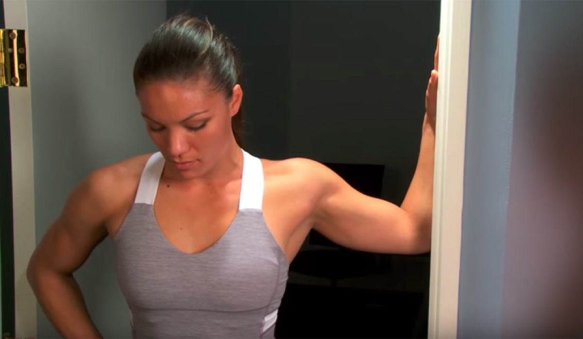 Woman doing pectoralis stretch