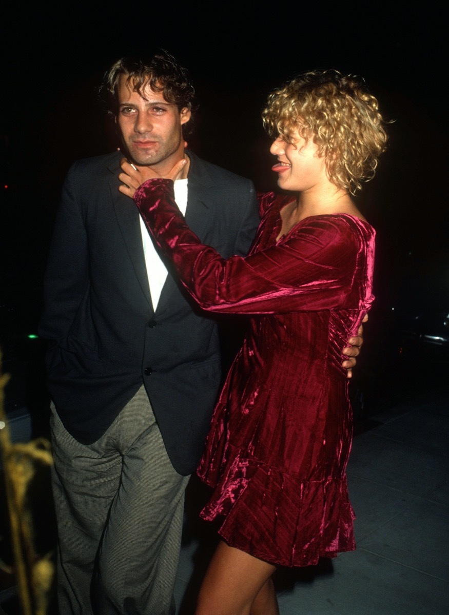 Adrian Pasdar and Emily Lloyd