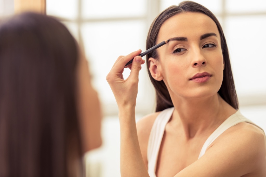 Girl doing eyebrows Appearing More Attractive