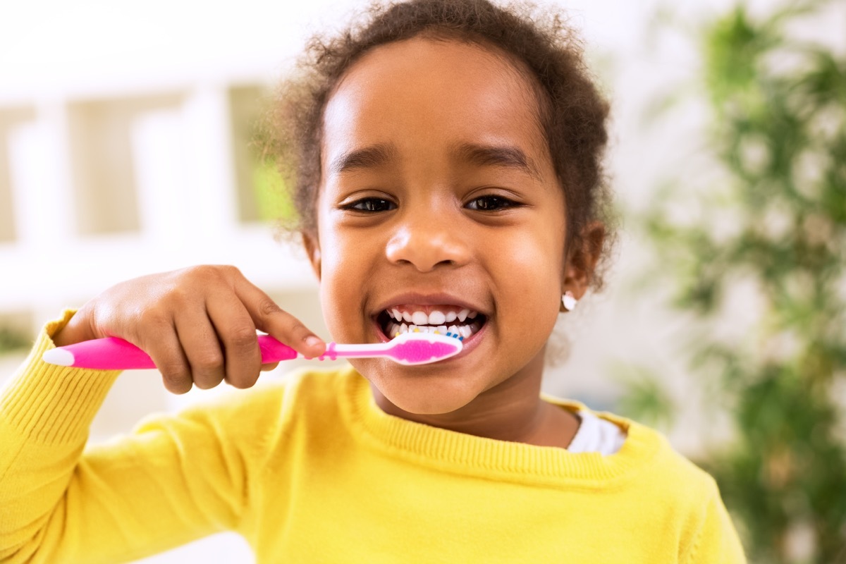 Little Girl Brushing Her Teeth Childhood Habits That Affect Health