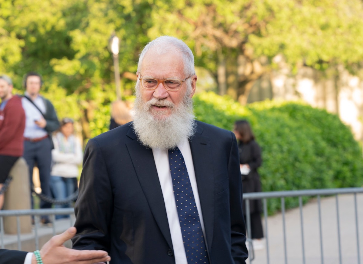 David Letterman talking outside to someone out of frame