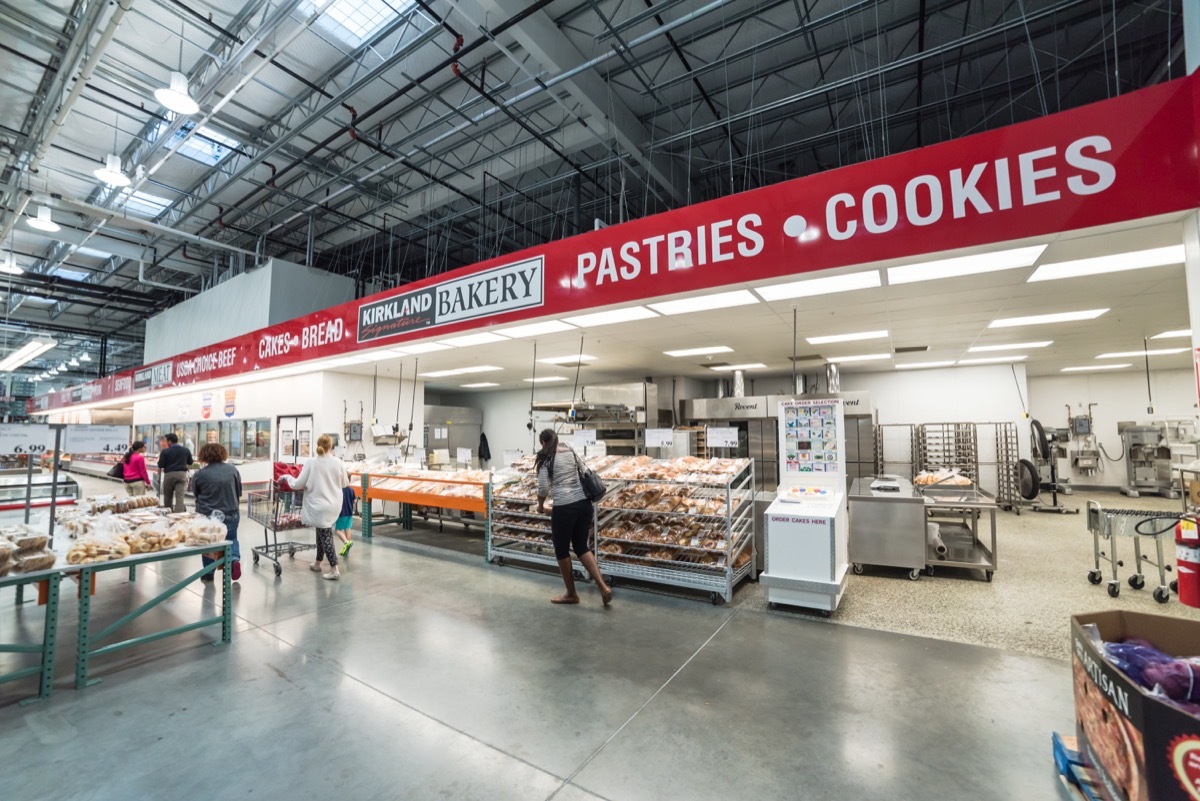 Bakery aisle in Costco store. It is largest wholesale membership-only warehouse club and second largest retailer in US, known for its low-price offers. Customer shopping